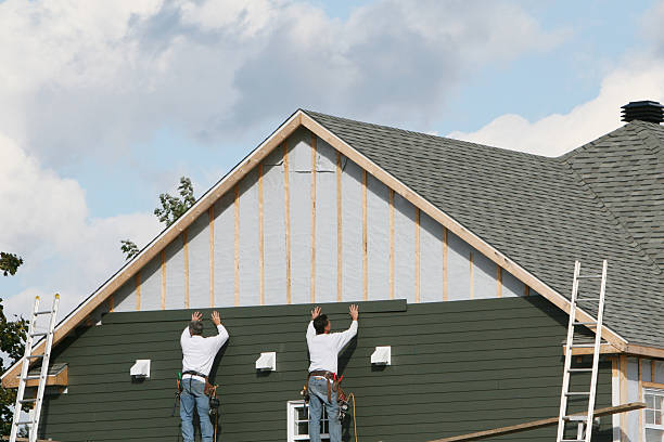Professional Siding technician working in Marion, PA